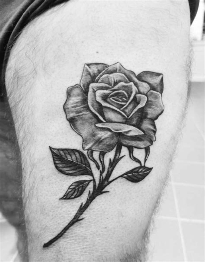 25 Stylish Rose Tattoos For Men