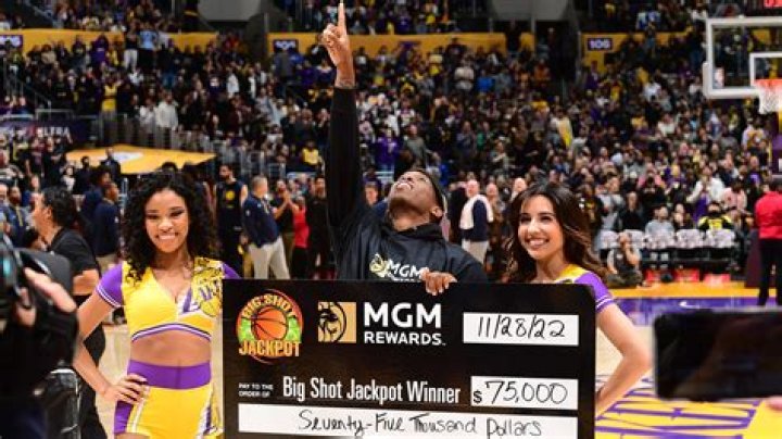 Lakers Fan hits an epic half-court shot wins $75,000 with a hug from L.A. superstar Anthony Davis