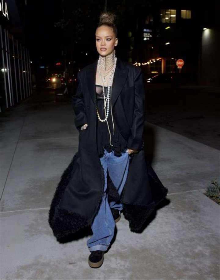Rihanna Paired Her Sheer Bra With an Oversized Trench Coat and Too Many Strands of Pearls to Count