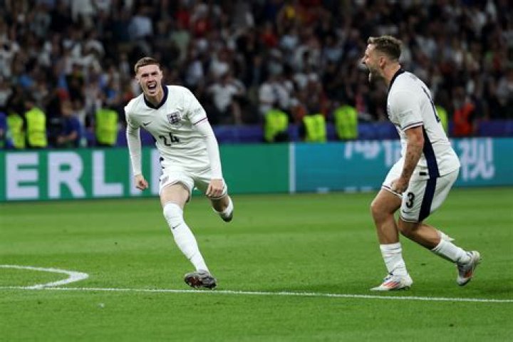 Spain beat England as Beckham equals record