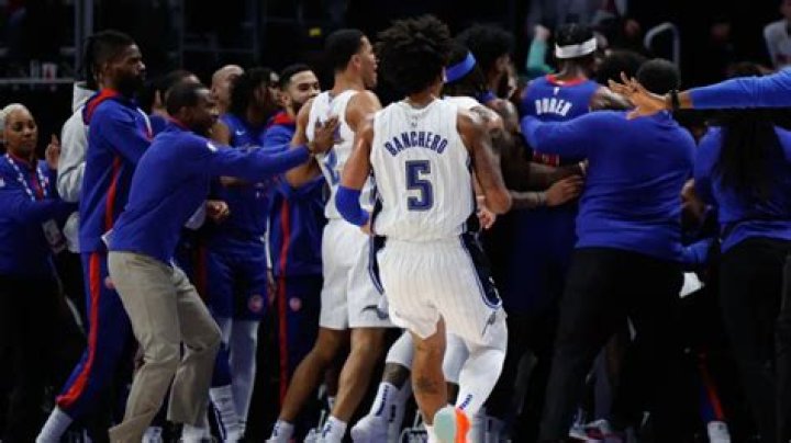 Why were 9 Magic players suspended following brawl with Pistons?